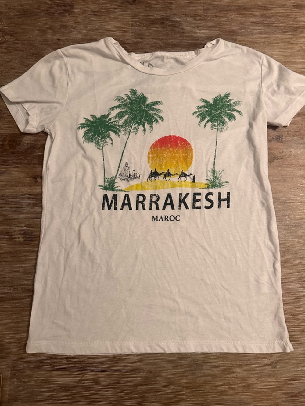 Chaser White Tee with Green Palm Trees and Red-Orange Sunset Graphic